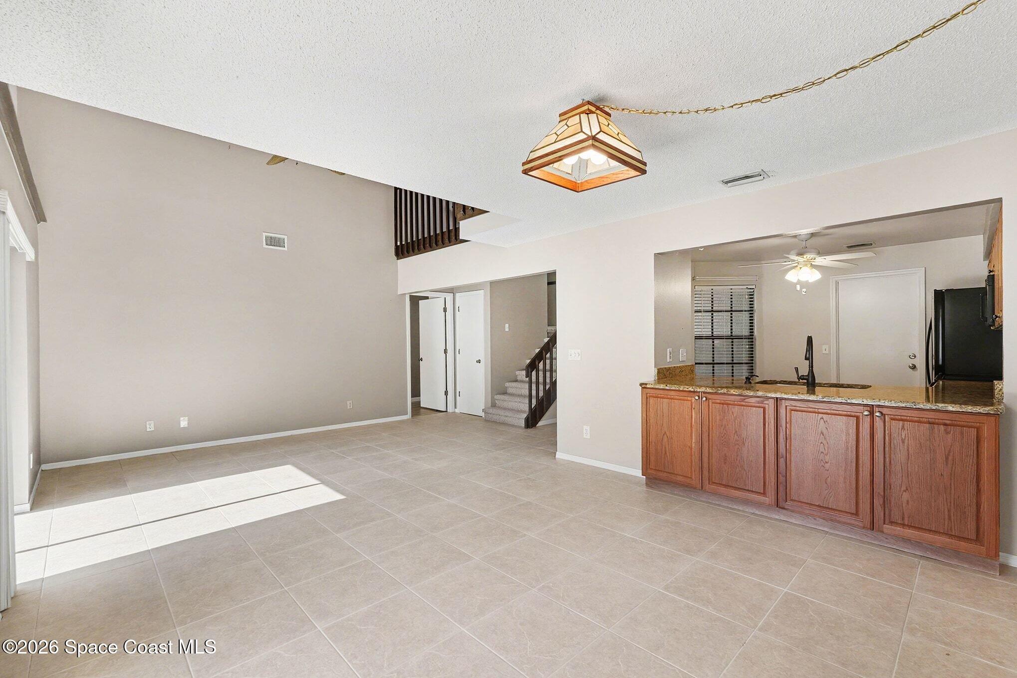 2653 Elliot Way, Unit 6 Melbourne, FL 32935 - Photo 6 of 30 a view of a kitchen and a window