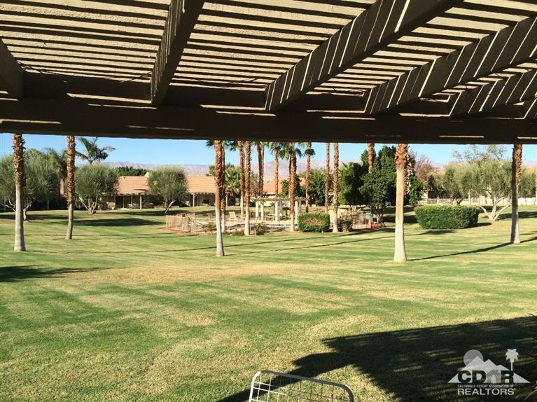 79385 Horizon Palms Circle La Quinta, CA 92253 - Photo 4 of 13 a view of swimming pool with outdoor seating