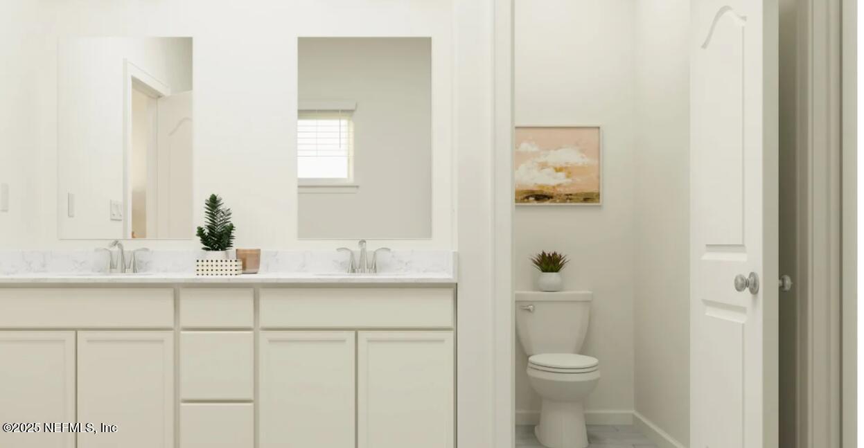 88 Round Robin Run St. Johns, FL 32259 - Photo 27 of 33 a bathroom with a sink a toilet and shower