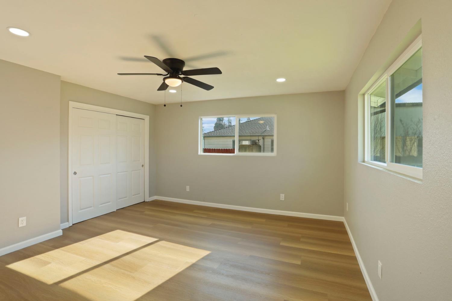 401 Church Street Modesto, CA 95357 - Photo 13 of 28 a view of an empty room with a window