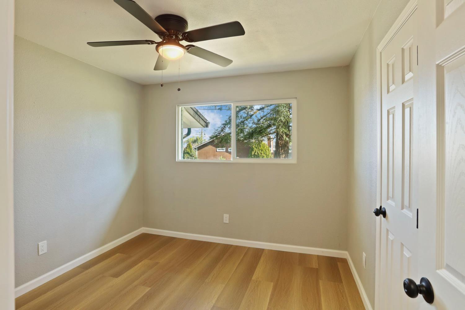 401 Church Street Modesto, CA 95357 - Photo 17 of 28 a view of room with window and ceiling fan