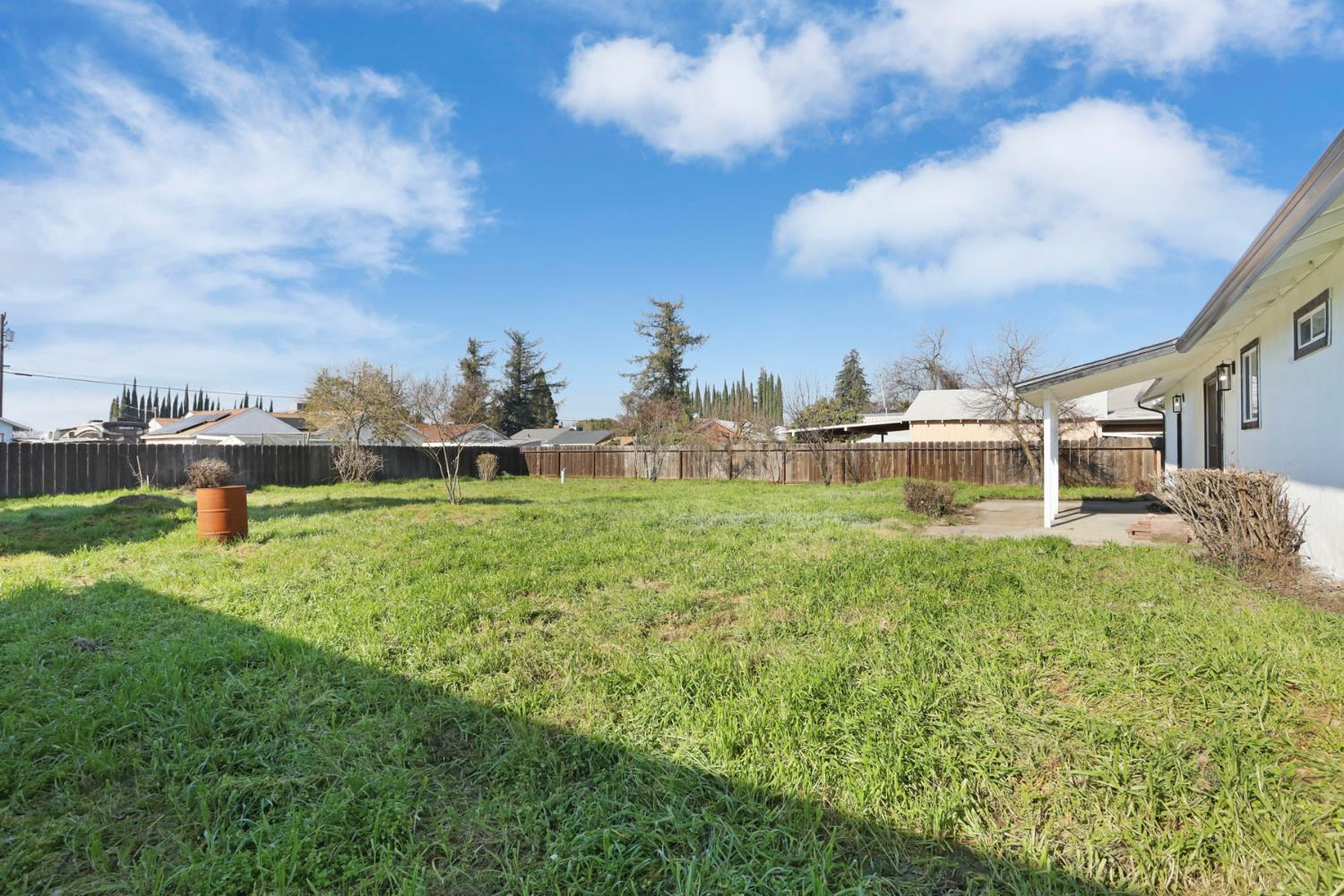 401 Church Street Modesto, CA 95357 - Photo 23 of 28 a front view of a house with a yard