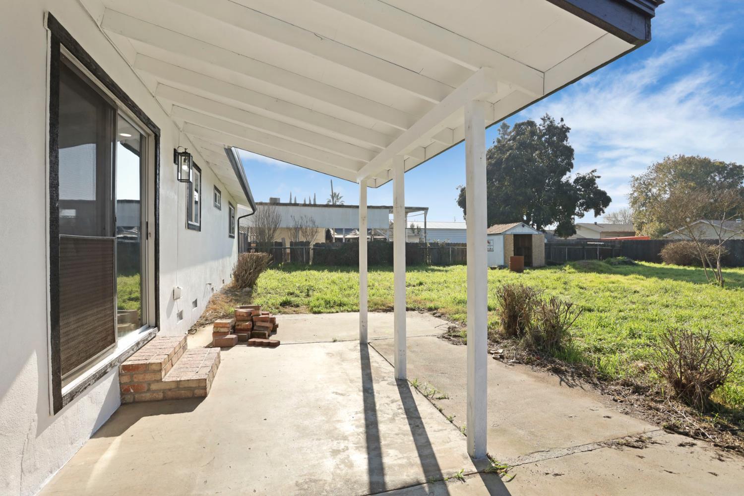 401 Church Street Modesto, CA 95357 - Photo 25 of 28 a view of a house with a yard