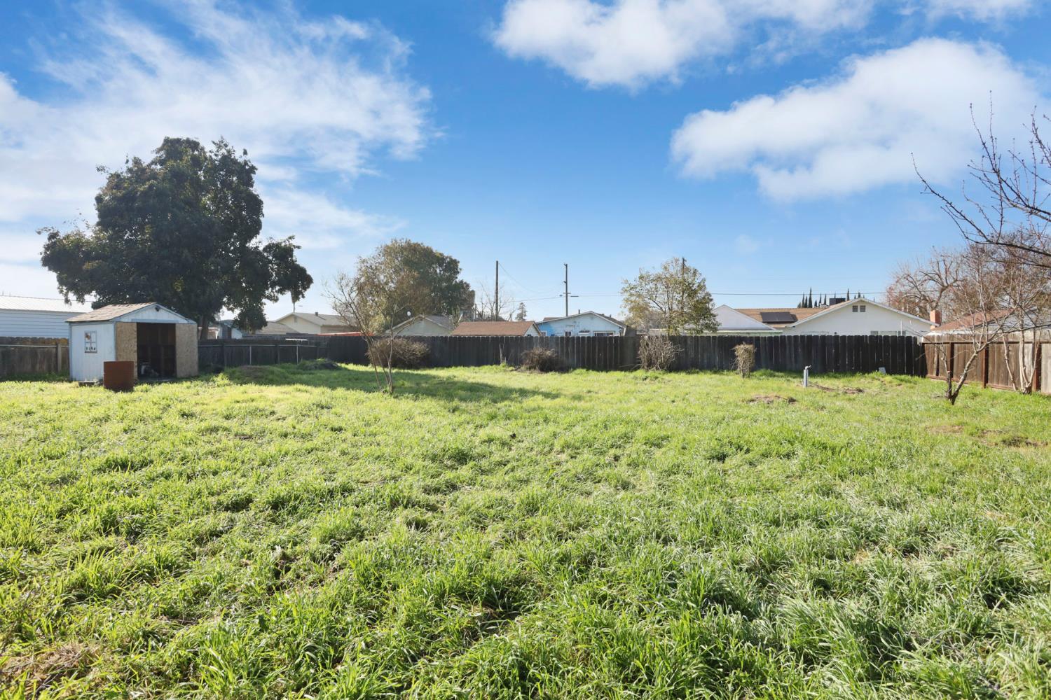 401 Church Street Modesto, CA 95357 - Photo 26 of 28 a front view of a house with a yard