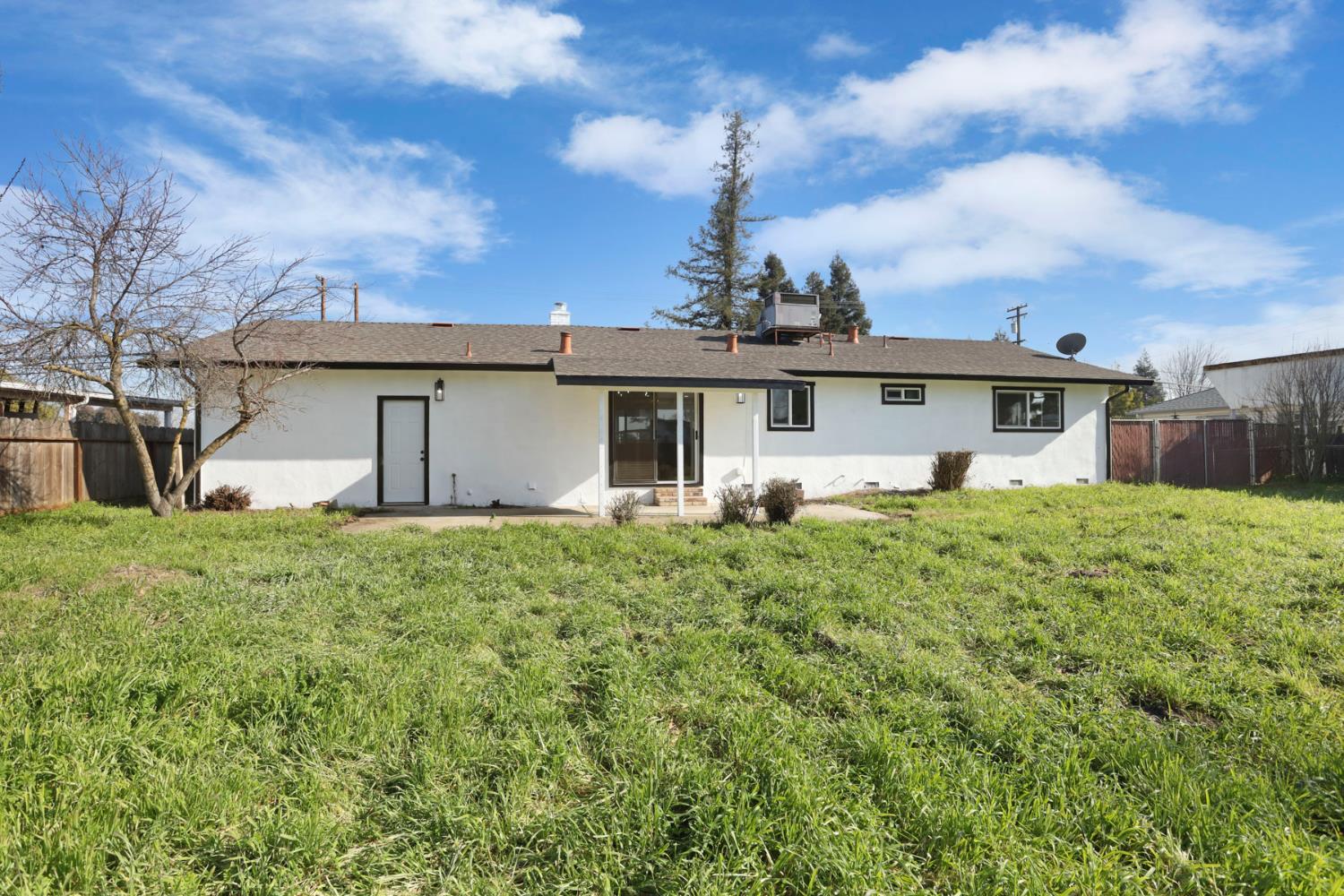 401 Church Street Modesto, CA 95357 - Photo 27 of 28 a front view of a house with a garden