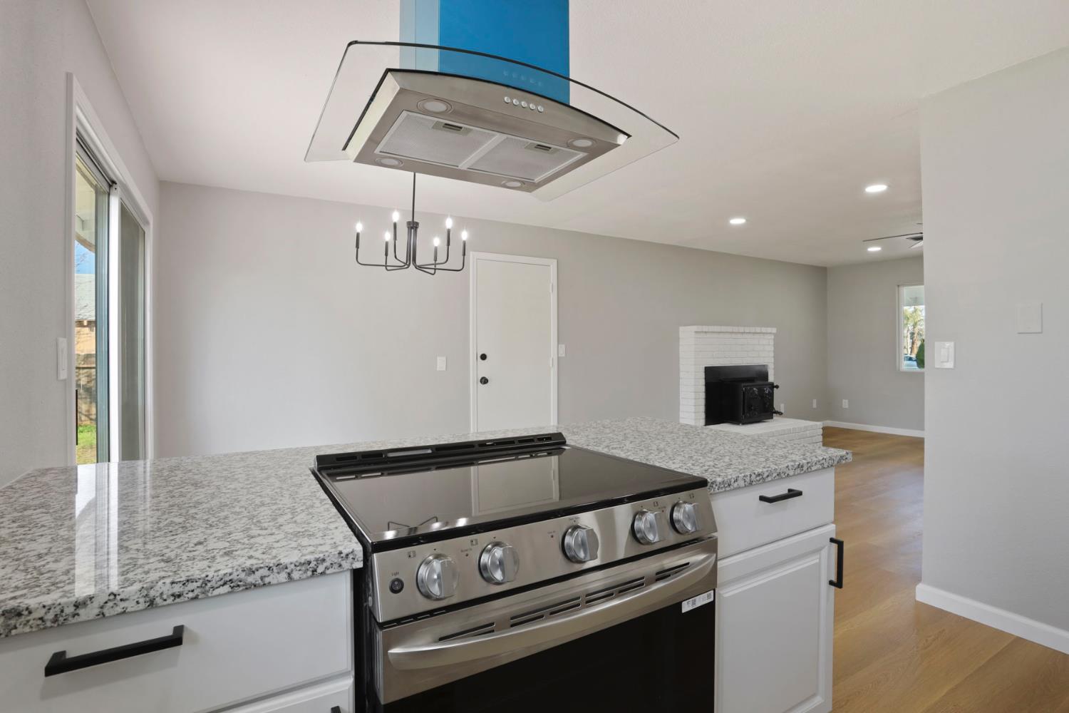 401 Church Street Modesto, CA 95357 - Photo 10 of 28 a kitchen with a stove and a sink