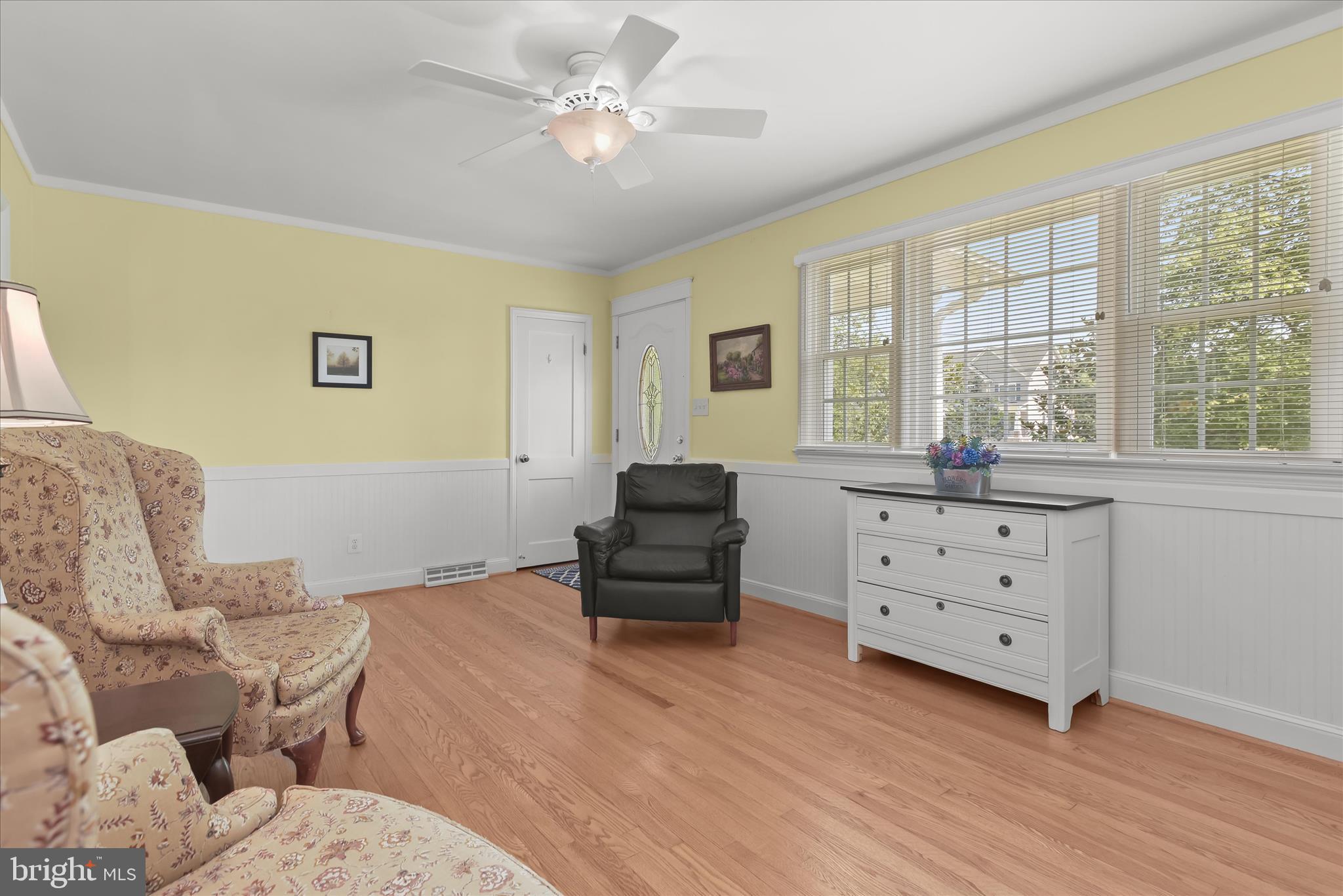 12351 Scaggsville Road Highland, MD 20777 - Photo 11 of 43 a living room with furniture and two windows