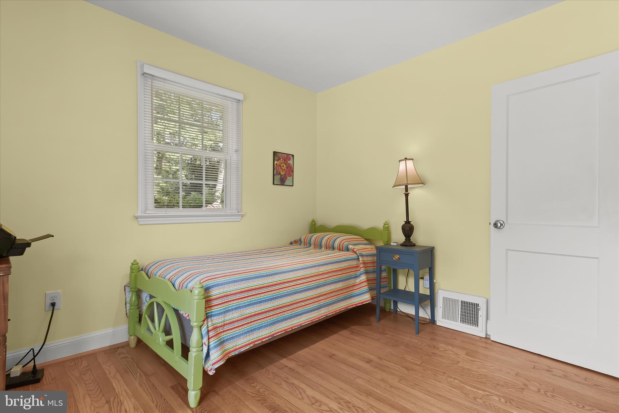 12351 Scaggsville Road Highland, MD 20777 - Photo 21 of 43 a bedroom with a bed and a window