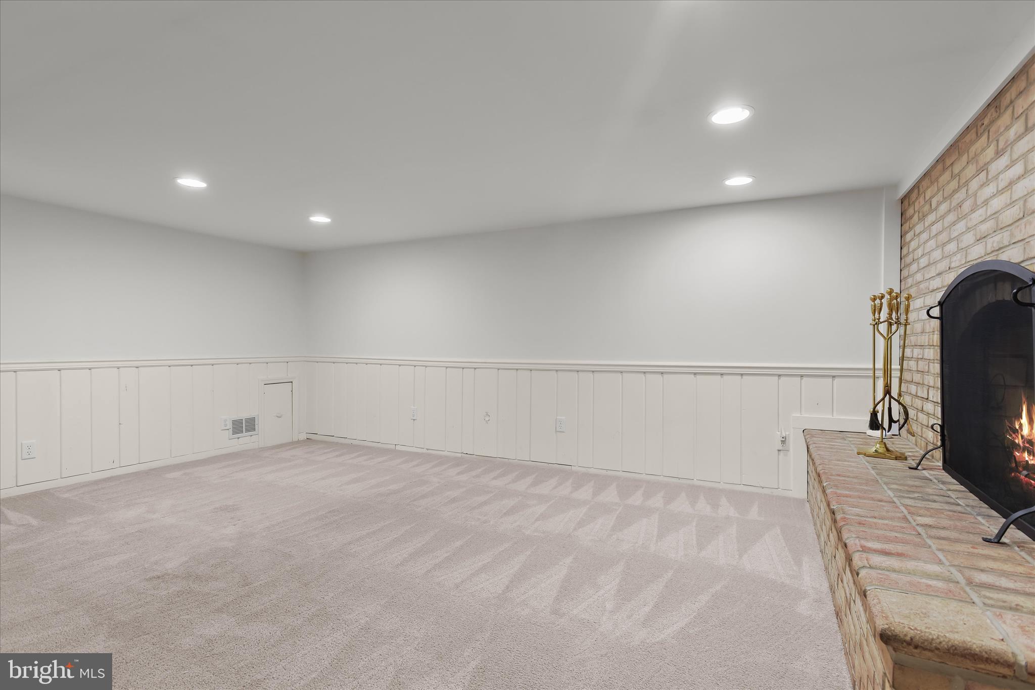 12351 Scaggsville Road Highland, MD 20777 - Photo 24 of 43 a view of empty room with wooden floor