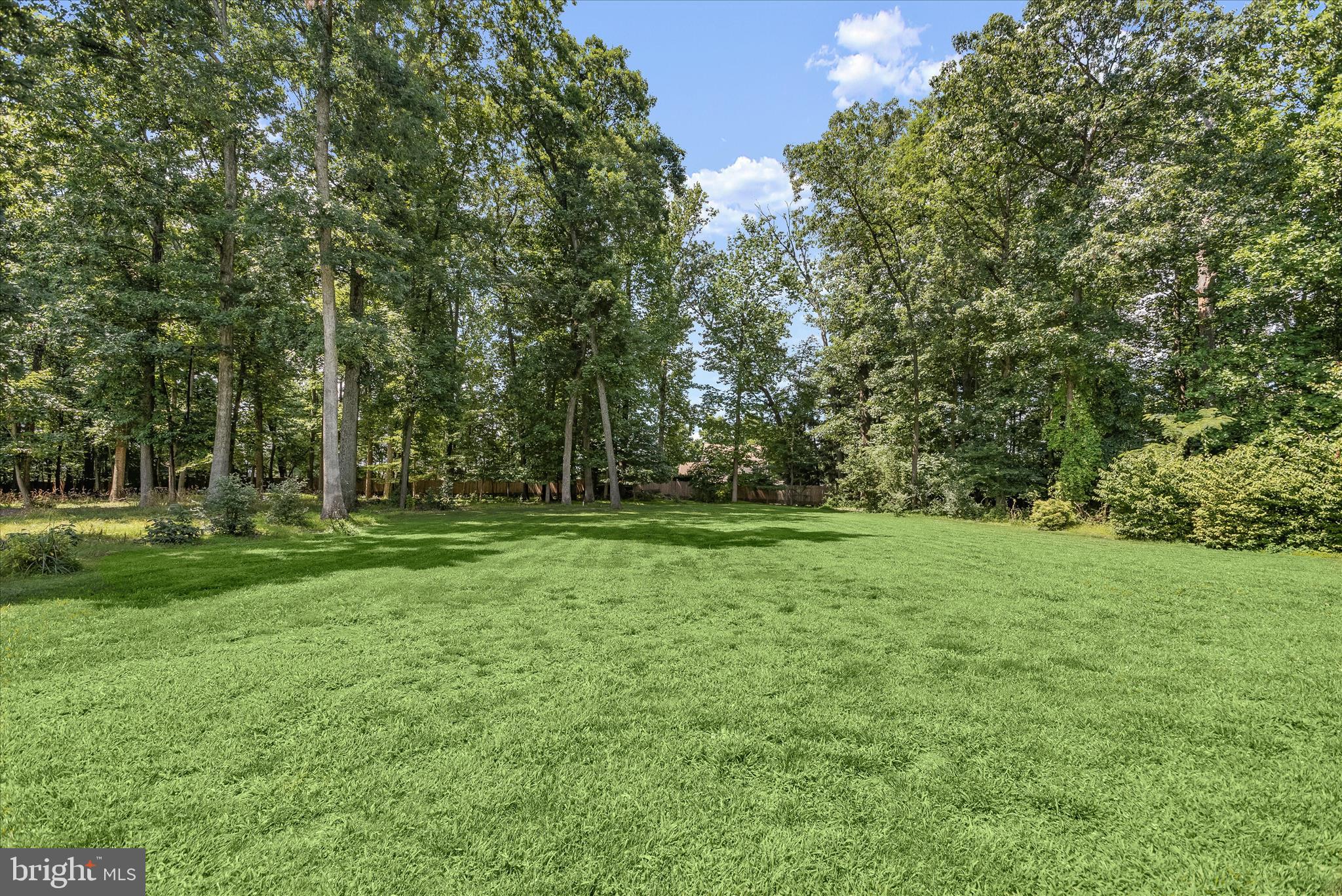 12351 Scaggsville Road Highland, MD 20777 - Photo 31 of 43 a view of outdoor space with deck and yard
