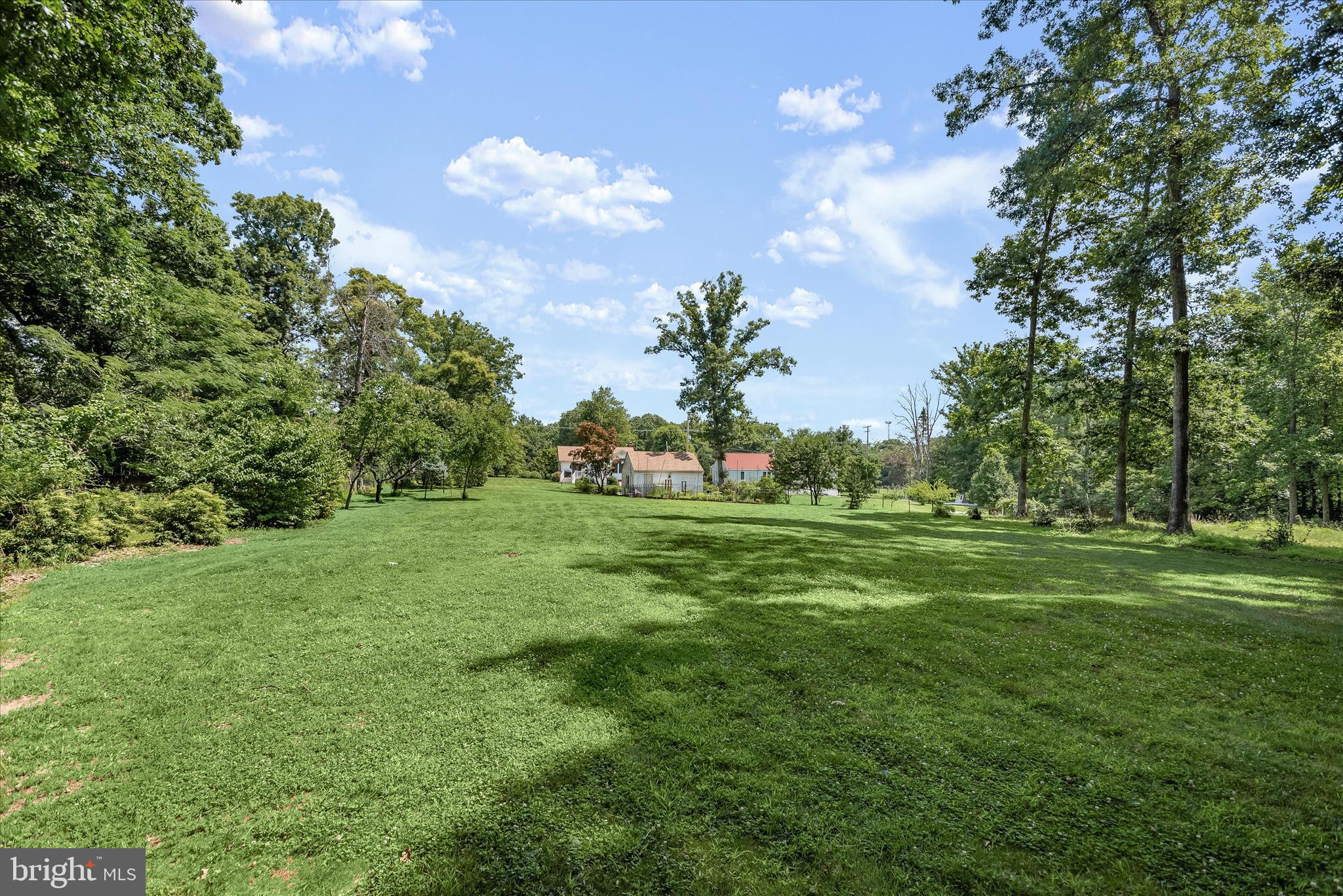 12351 Scaggsville Road Highland, MD 20777 - Photo 32 of 43 a view of a grassy field with trees