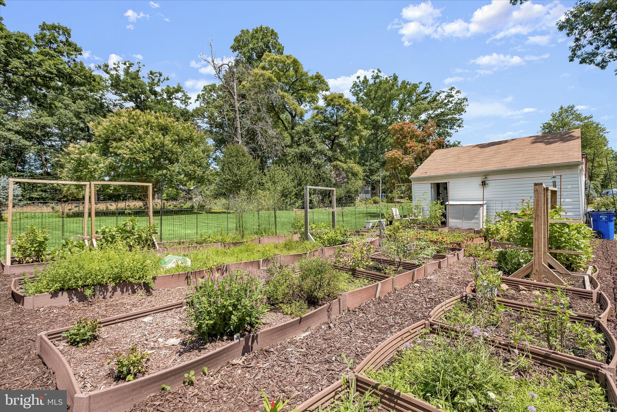 12351 Scaggsville Road Highland, MD 20777 - Photo 33 of 43 a backyard of a house with lots of green space