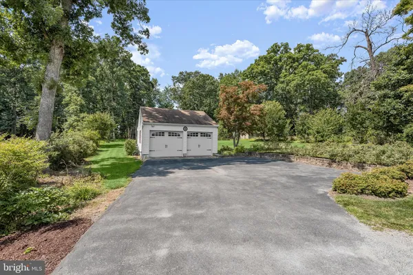 a view of a car park in front of house