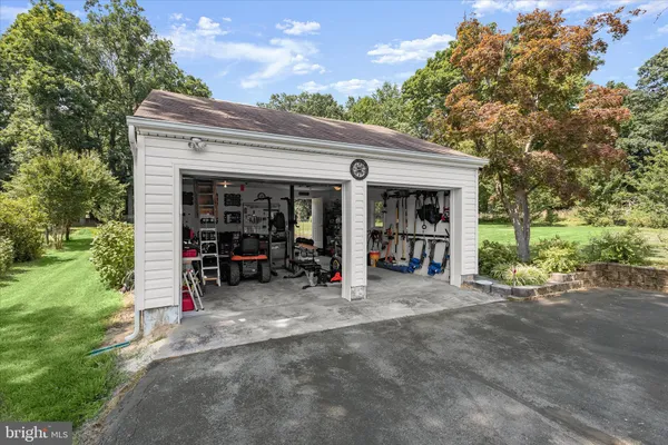 a picture of a bench in front of a wall