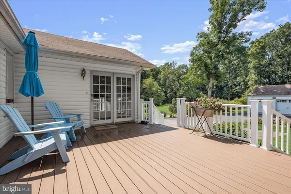 a view of a chairs on the roof deck