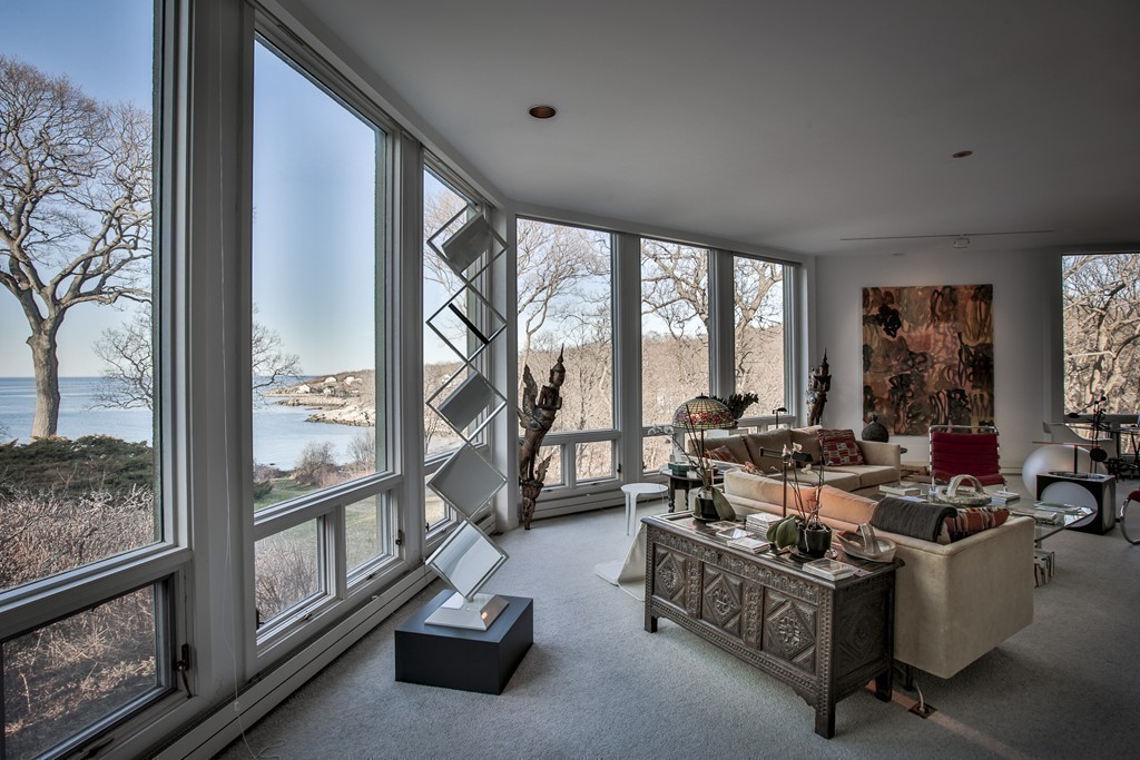 1 Folly Point Road Gloucester, MA 01930 - Photo 16 of 30 a living room with patio furniture and a large window