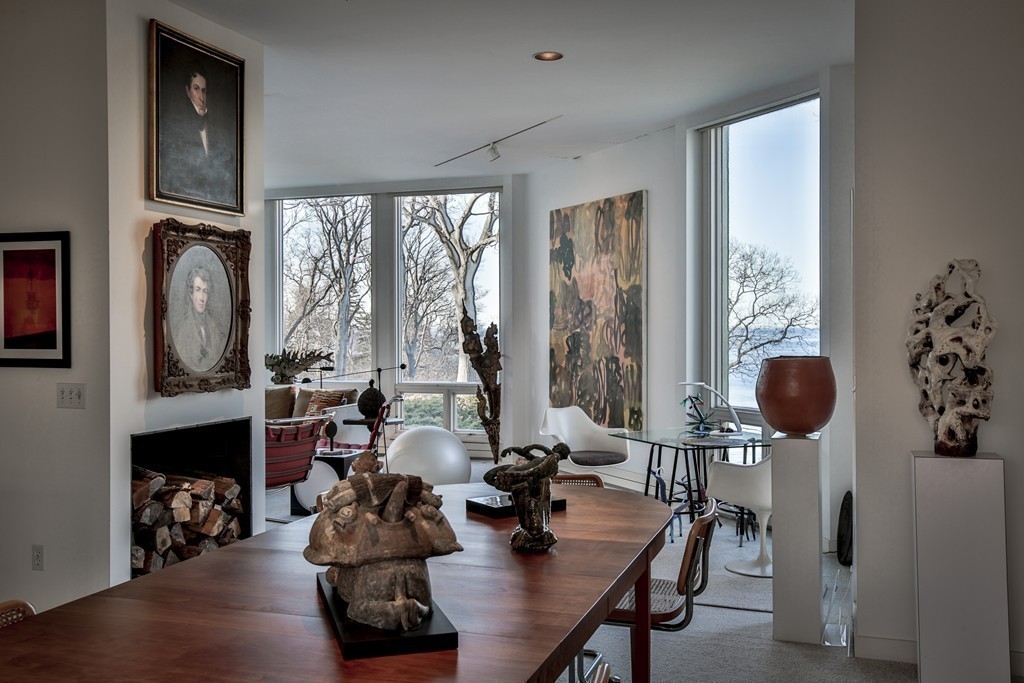 1 Folly Point Road Gloucester, MA 01930 - Photo 17 of 30 a room with furniture and large windows