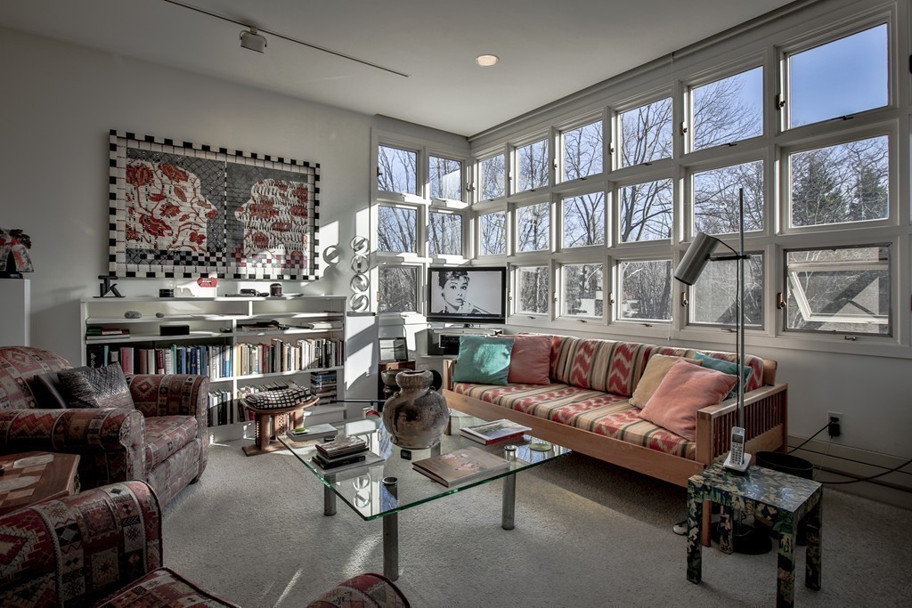 1 Folly Point Road Gloucester, MA 01930 - Photo 19 of 30 a living room with furniture a rug and a large window