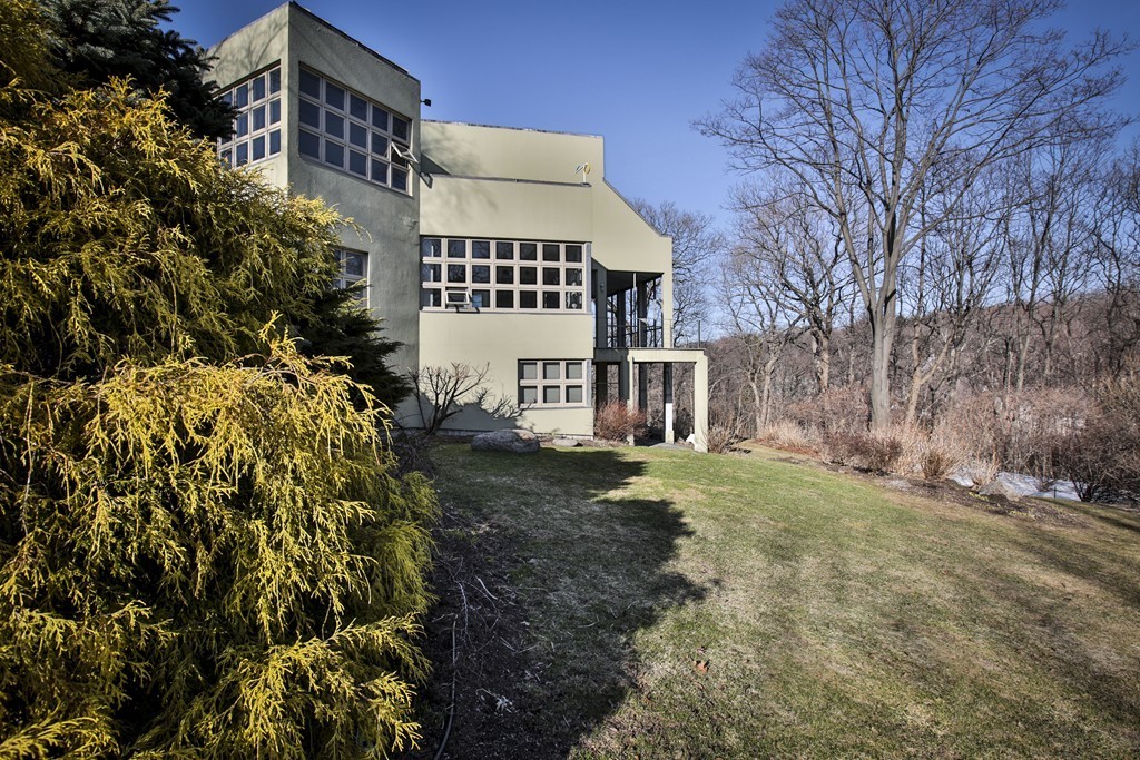 1 Folly Point Road Gloucester, MA 01930 - Photo 3 of 30 a view of a yard with plants and trees