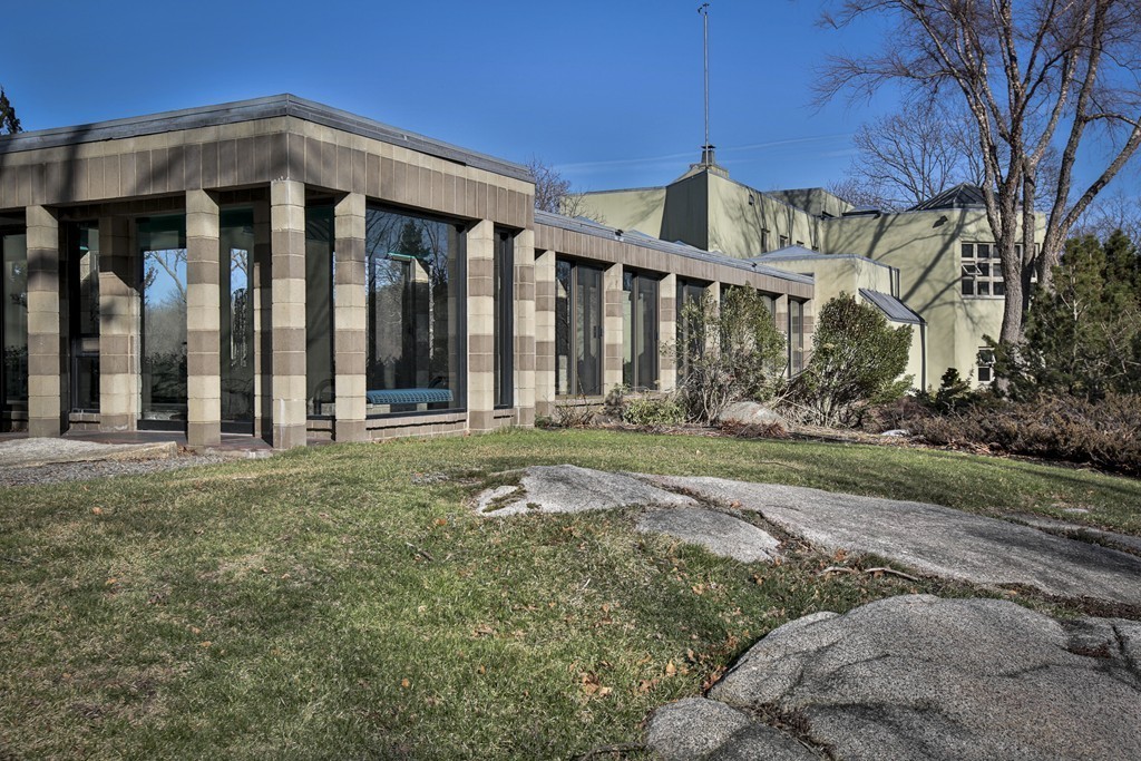 1 Folly Point Road Gloucester, MA 01930 - Photo 4 of 30 a front view of a house with a yard