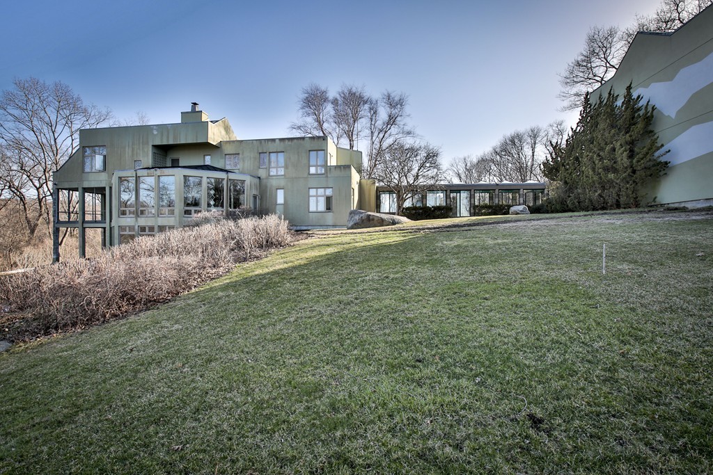 1 Folly Point Road Gloucester, MA 01930 - Photo 5 of 30 a view of a back yard of the house