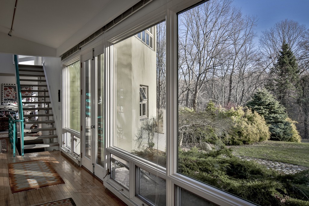 1 Folly Point Road Gloucester, MA 01930 - Photo 9 of 30 a view of a balcony with plants