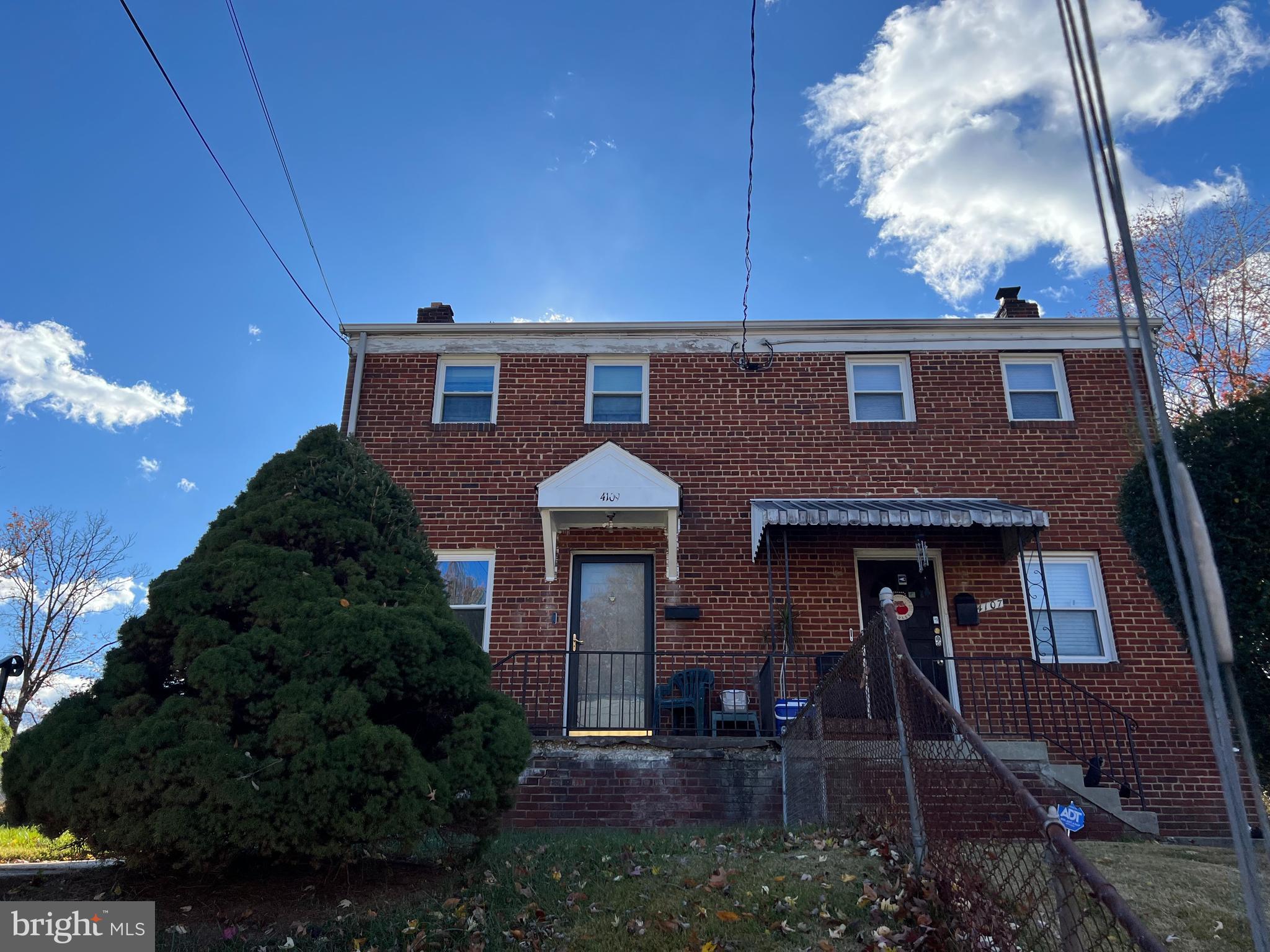 4109 25th Avenue Temple Hills, MD 20748 - Photo 2 of 4 a front view of a house with a yard