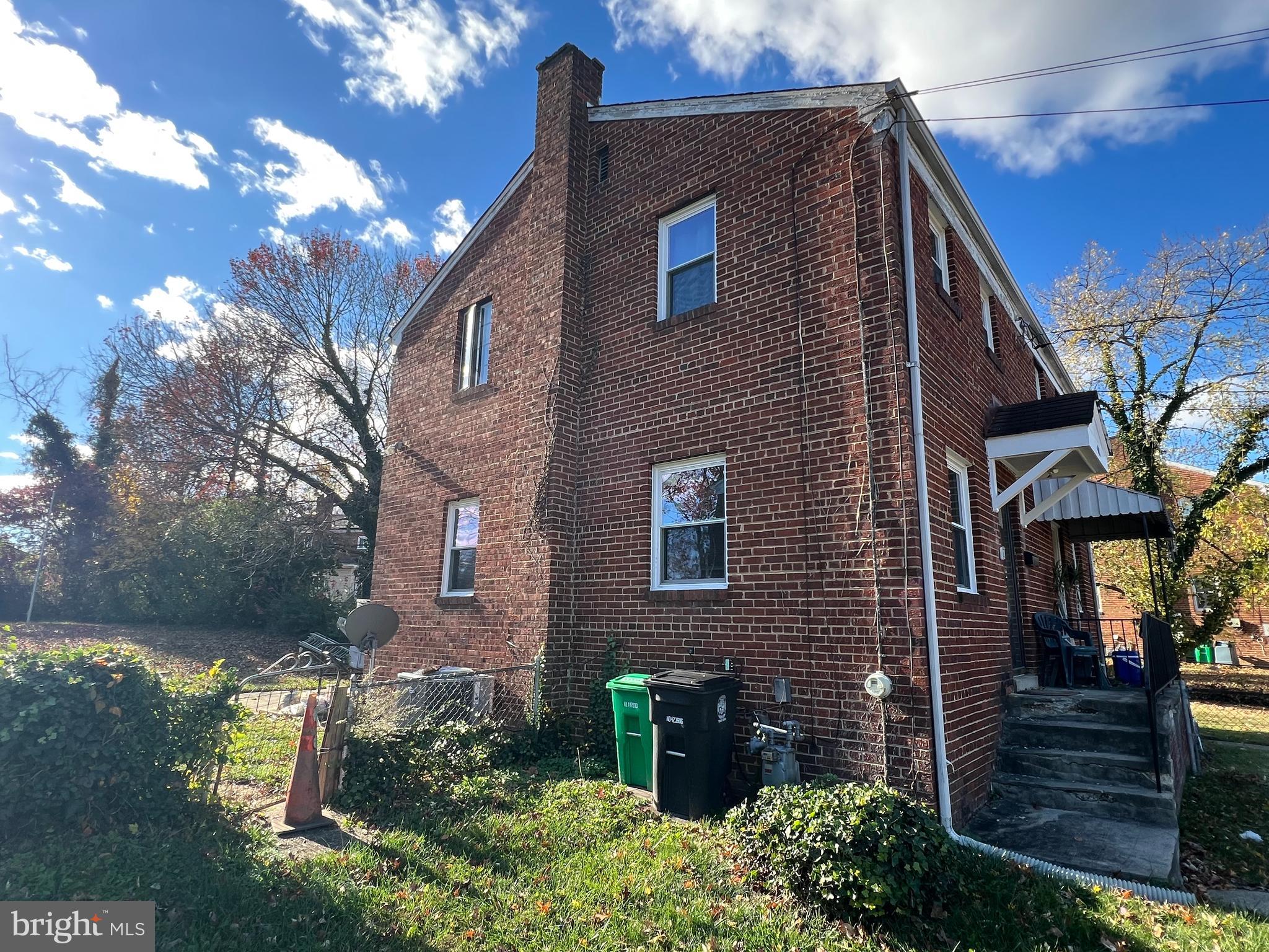 4109 25th Avenue Temple Hills, MD 20748 - Photo 3 of 4 a backyard of a house with lots of green space