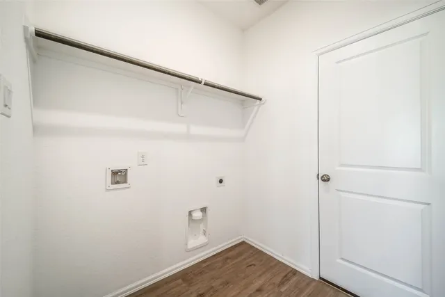 a view of small space with wooden floor