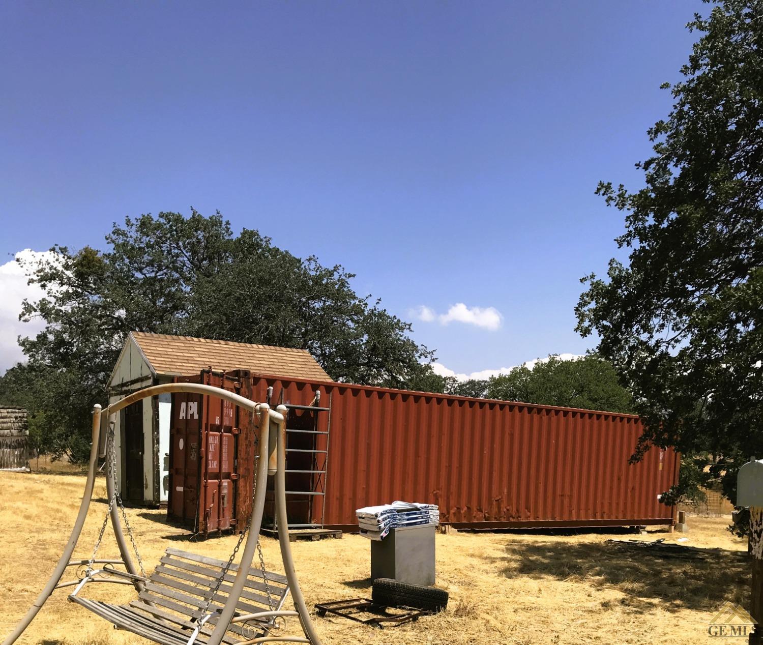Undisclosed Address Caliente, CA 93518 - Photo 5 of 14 a front view of a house with a garden