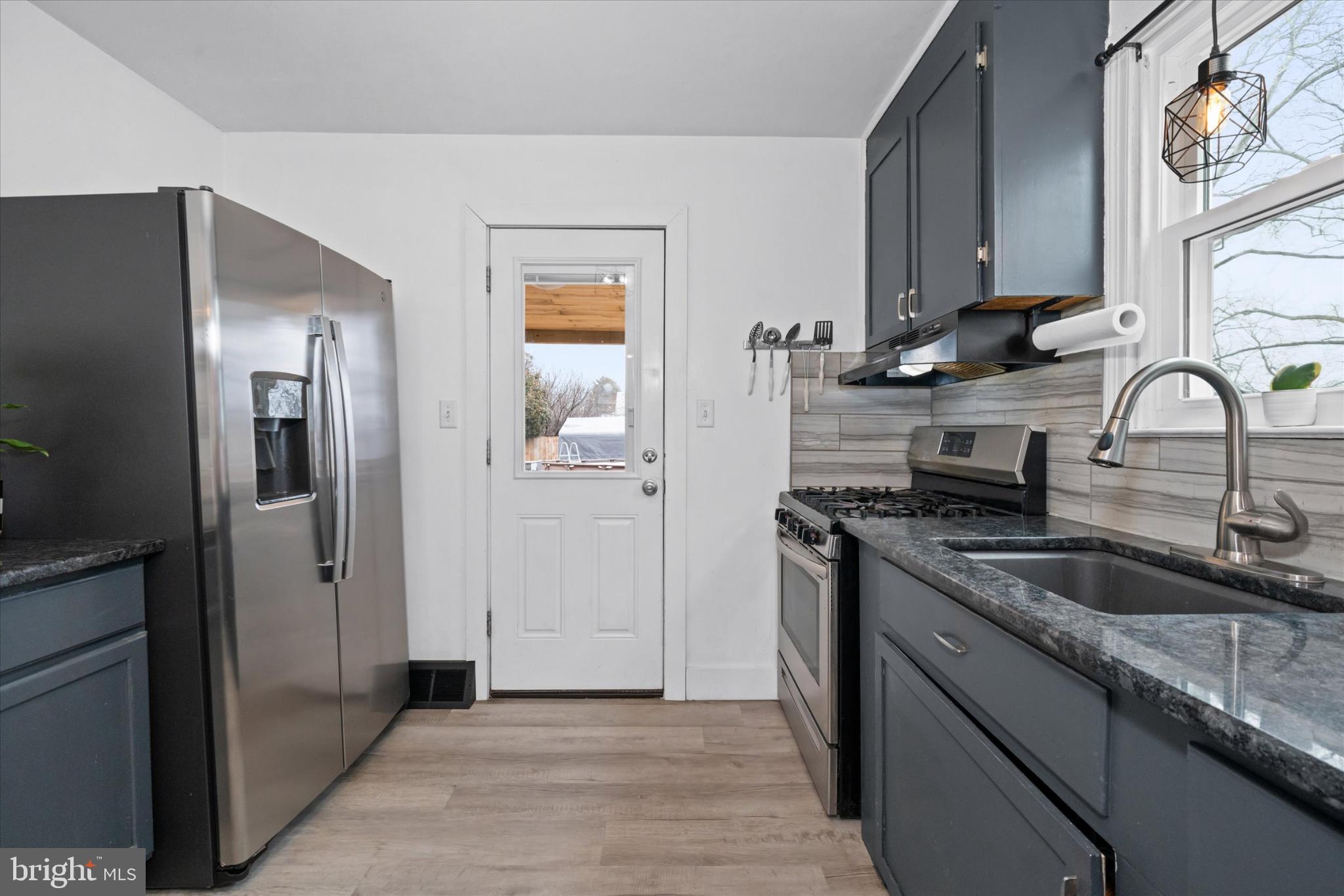 7 2nd Avenue New Castle, DE 19720 - Photo 23 of 44 Modern kitchen with sleek finishes.