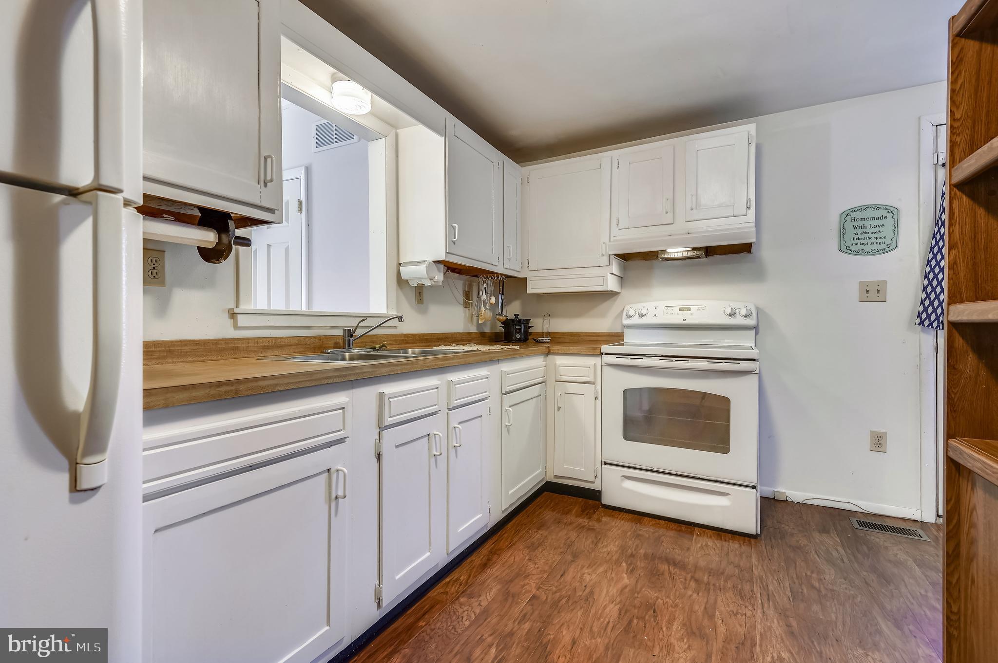 658 New Bridge Road Rising Sun, MD 21911 - Photo 12 of 35 a kitchen with cabinets oven and a dishwasher