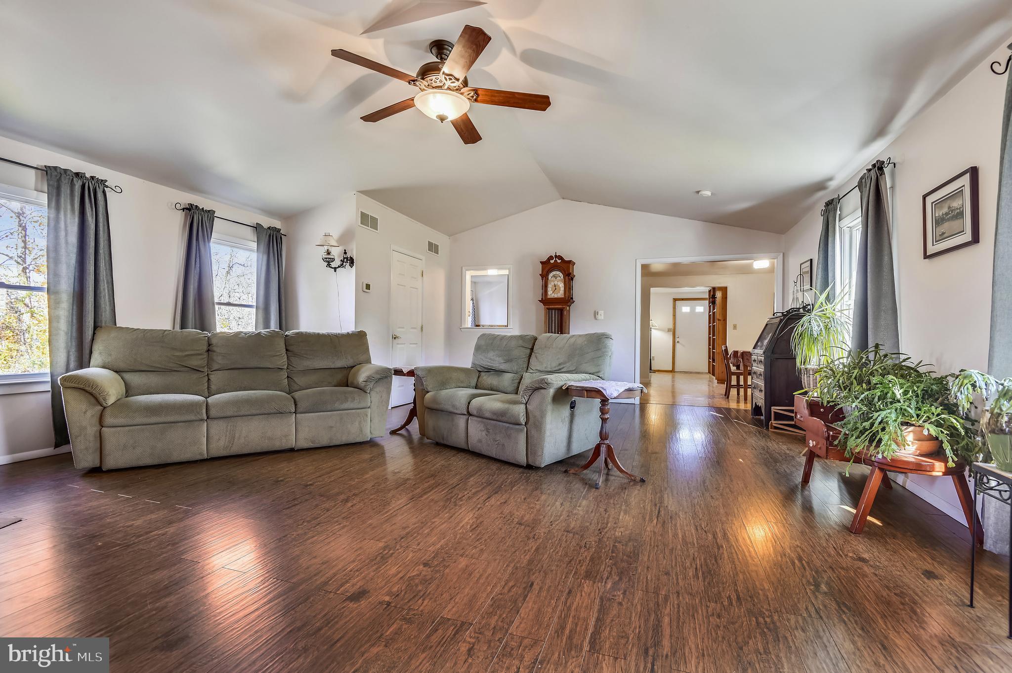 658 New Bridge Road Rising Sun, MD 21911 - Photo 16 of 35 a living room with furniture and a wooden floor