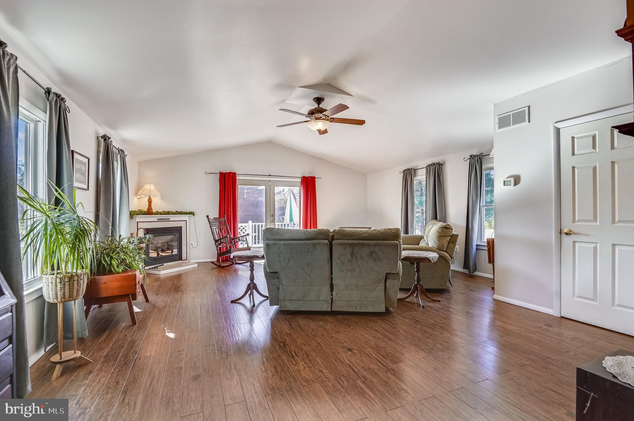 658 New Bridge Road Rising Sun, MD 21911 - Photo 18 of 35 a living room with furniture and a wooden floor