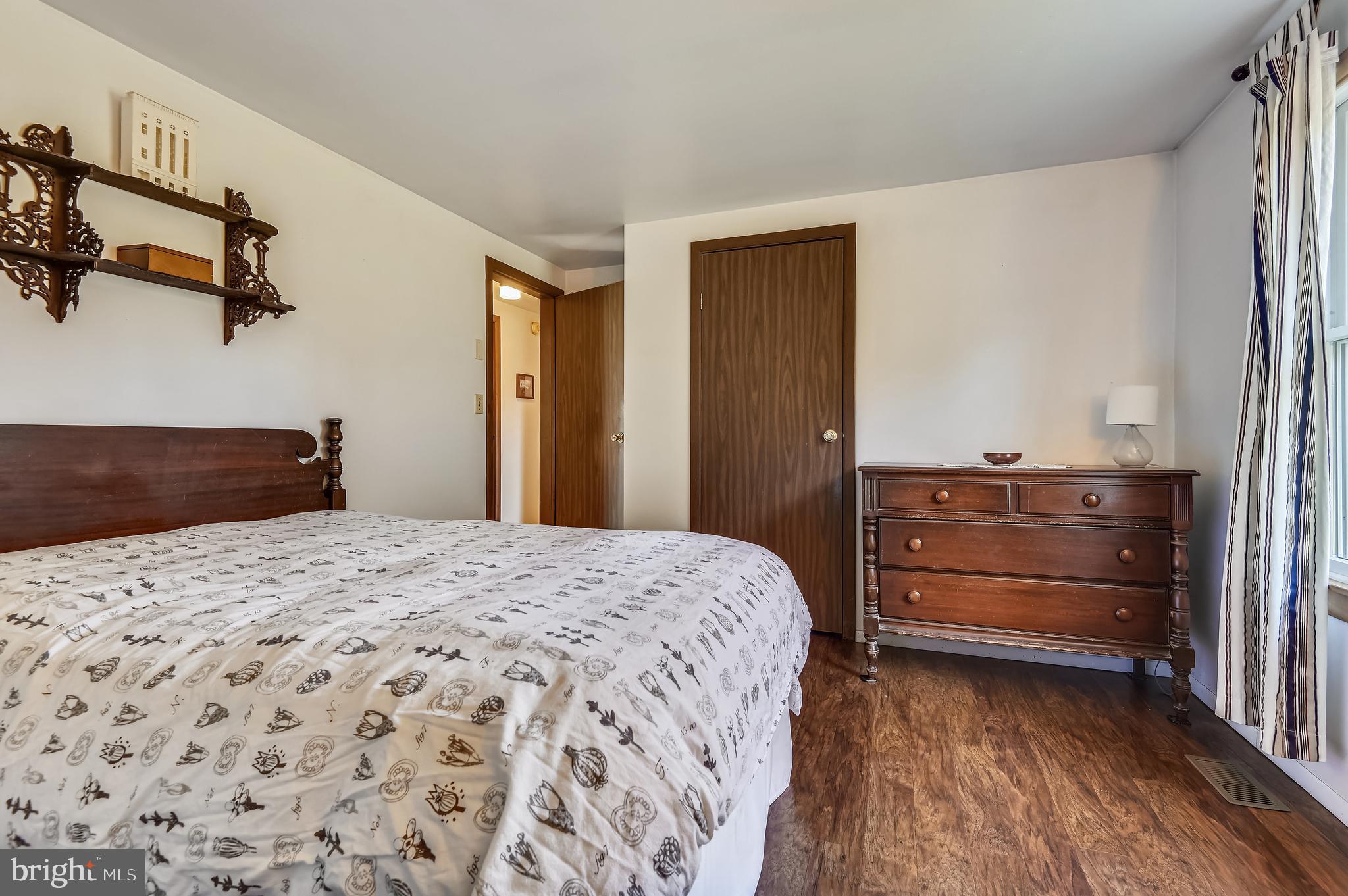 658 New Bridge Road Rising Sun, MD 21911 - Photo 20 of 35 a bedroom with a bed and a dresser