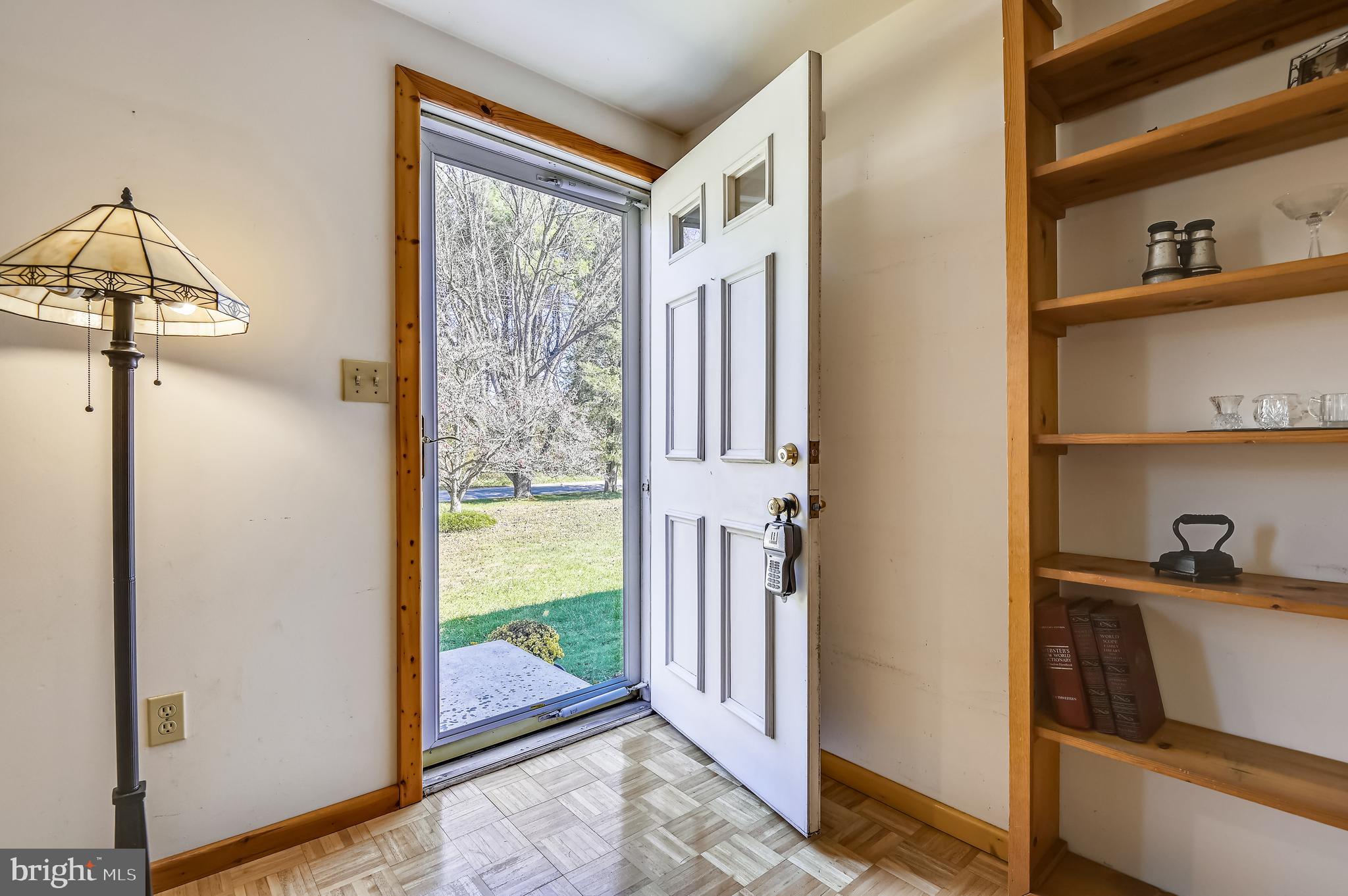 658 New Bridge Road Rising Sun, MD 21911 - Photo 5 of 35 a view of a hallway and a room with wooden floor