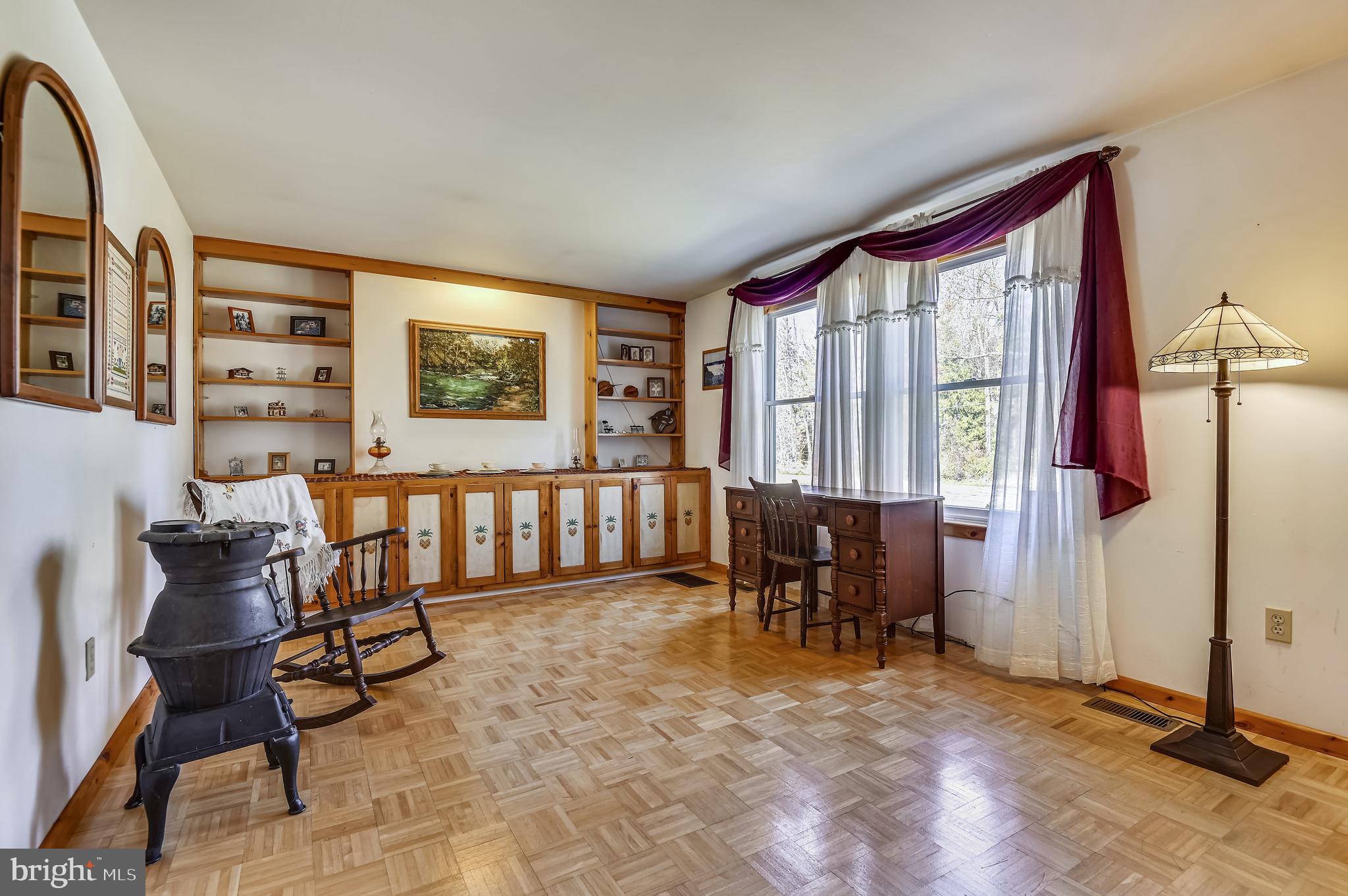 658 New Bridge Road Rising Sun, MD 21911 - Photo 7 of 35 a living room with furniture a window and a flat screen tv