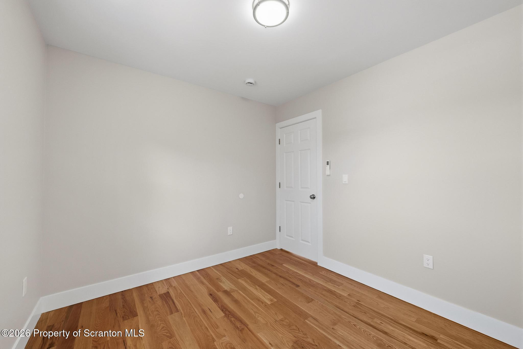 305 Parsonage Street Pittston, PA 18640 - Photo 30 of 42 a view of room with wooden floor