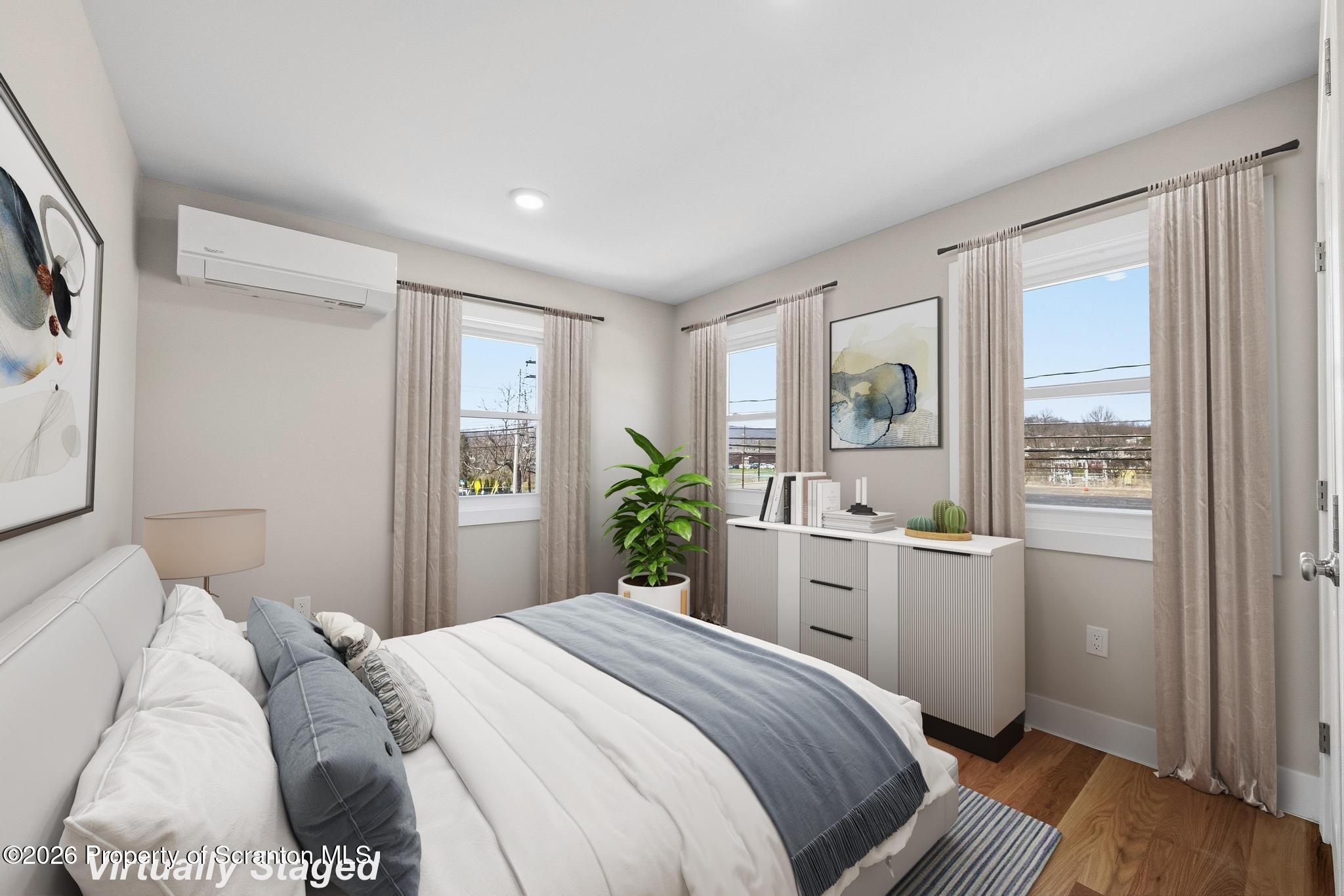 305 Parsonage Street Pittston, PA 18640 - Photo 31 of 42 a bedroom with a bed and a window