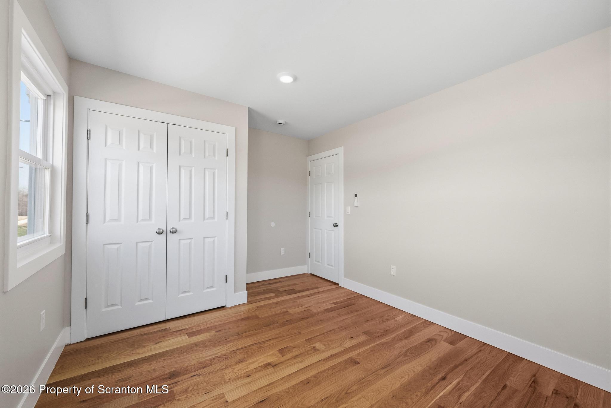 305 Parsonage Street Pittston, PA 18640 - Photo 33 of 42 a view of an empty room with wooden floor