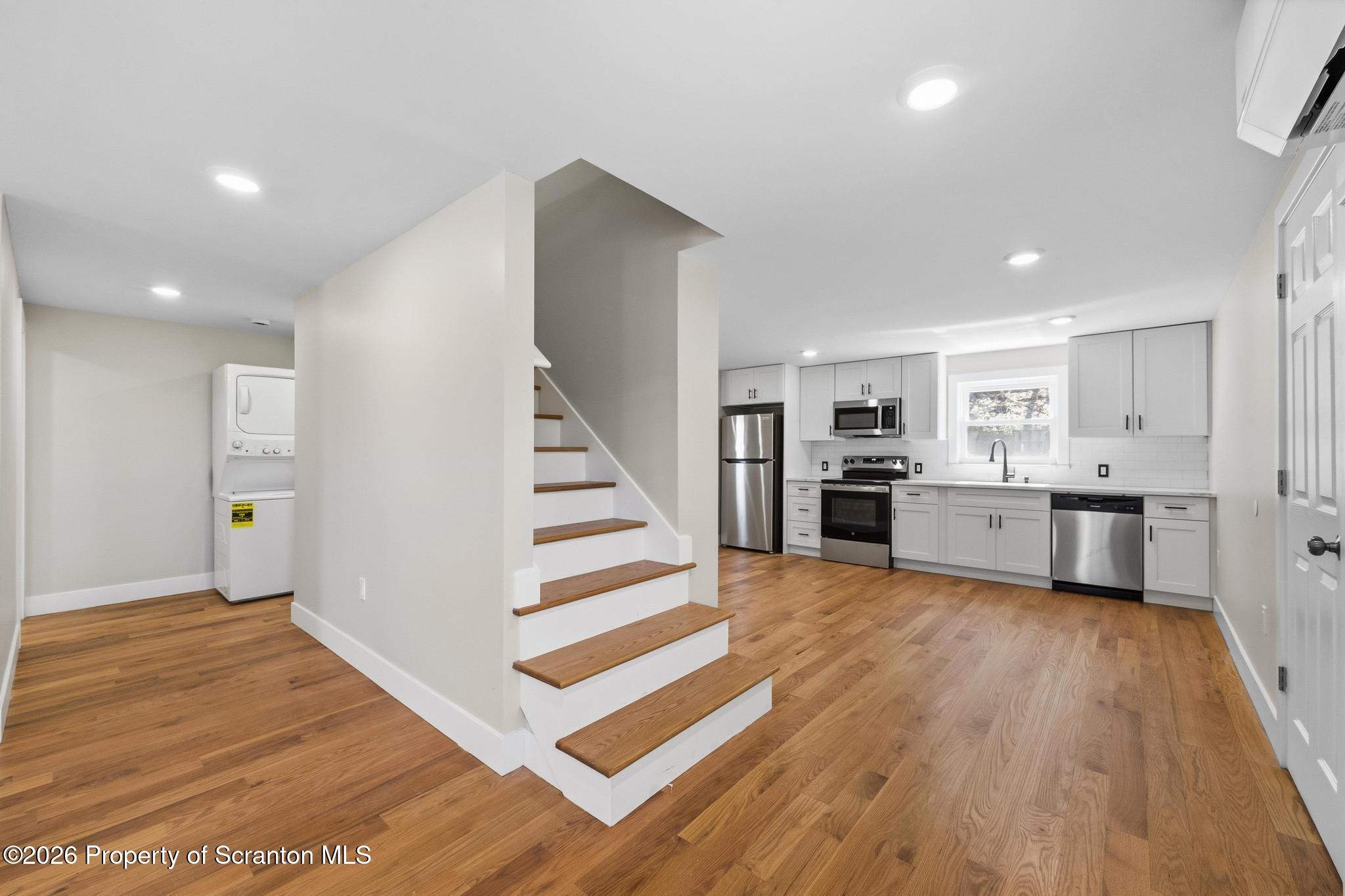 305 Parsonage Street Pittston, PA 18640 - Photo 9 of 42 a view of kitchen with wooden floor and electronic appliances