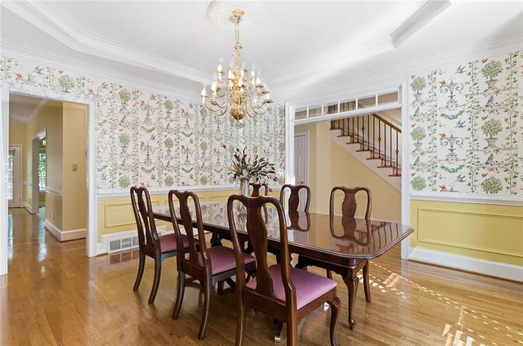 1401 Downington View Acworth, GA 30101 - Photo 11 of 57 a view of a dining room with furniture window and wooden floor