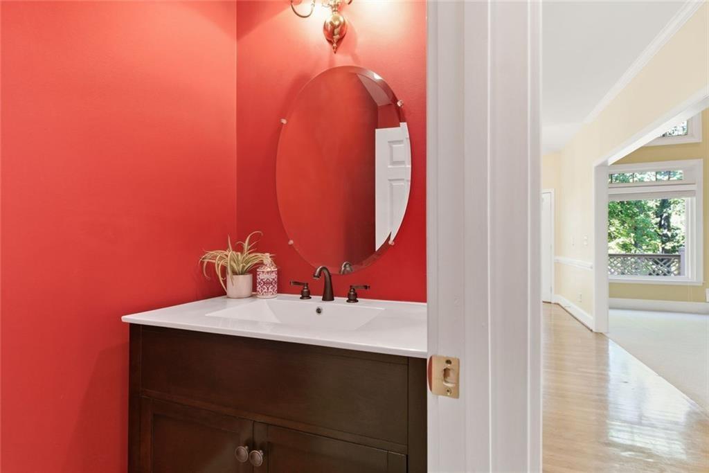 1401 Downington View Acworth, GA 30101 - Photo 12 of 57 a bathroom with a sink and a mirror