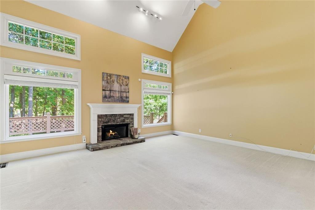 1401 Downington View Acworth, GA 30101 - Photo 13 of 57 a view of a livingroom with a fireplace and window