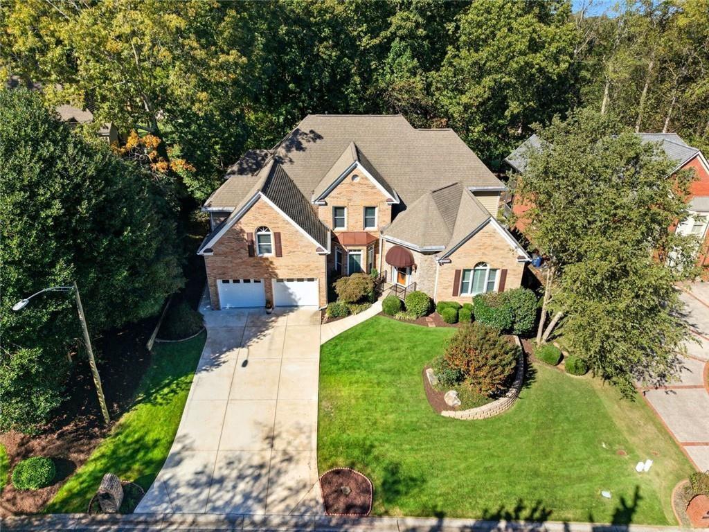 1401 Downington View Acworth, GA 30101 - Photo 2 of 57 an aerial view of a house with a yard