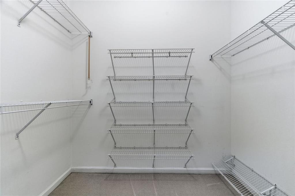 1401 Downington View Acworth, GA 30101 - Photo 24 of 57 a view of a room with racks on the wall