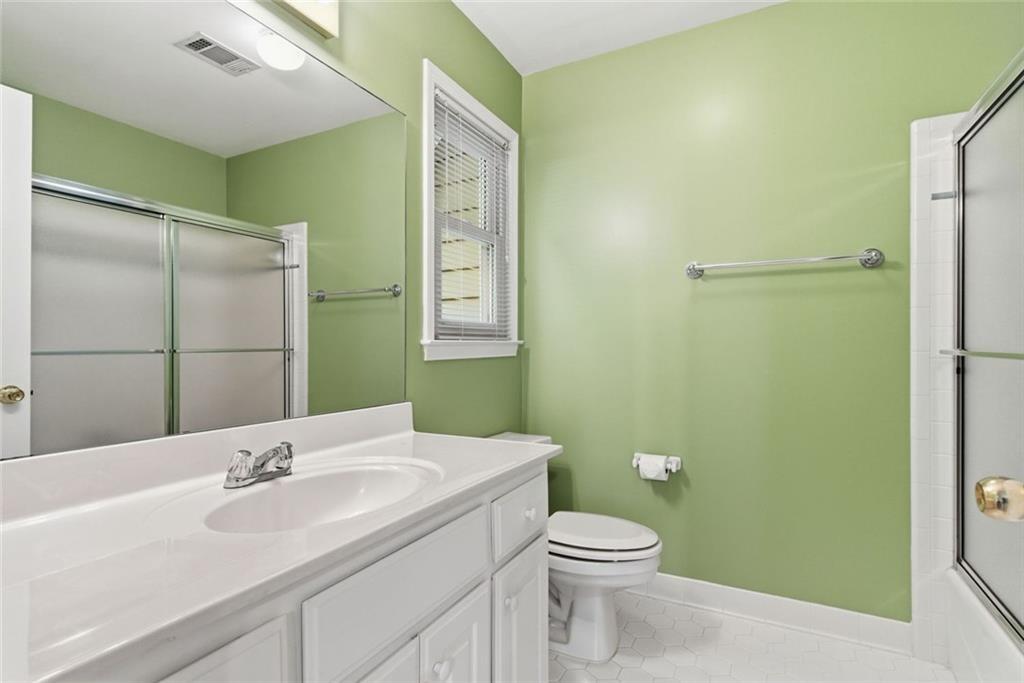 1401 Downington View Acworth, GA 30101 - Photo 31 of 57 a bathroom with a sink and a mirror