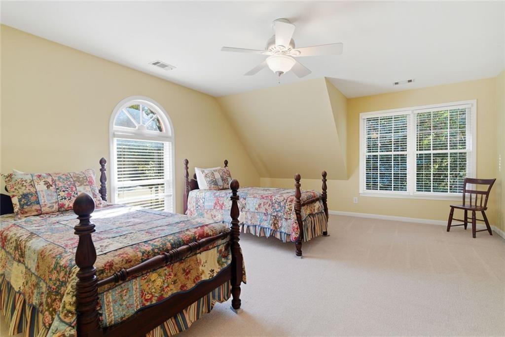 1401 Downington View Acworth, GA 30101 - Photo 34 of 57 a bedroom with furniture and a large window