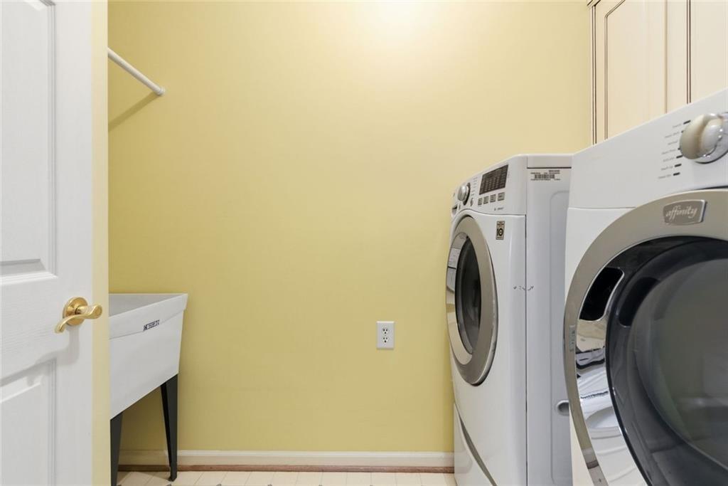 1401 Downington View Acworth, GA 30101 - Photo 36 of 57 a utility room with dryer and washer