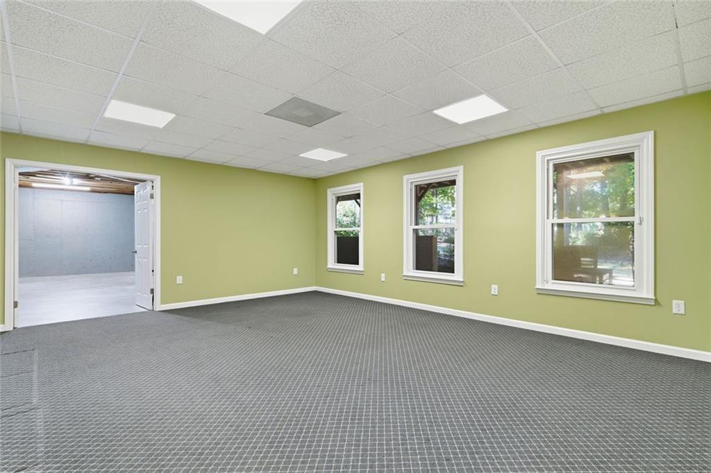 1401 Downington View Acworth, GA 30101 - Photo 43 of 57 a view of an empty room with window and wooden floor